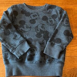 Mickey Mouse sweatshirt.